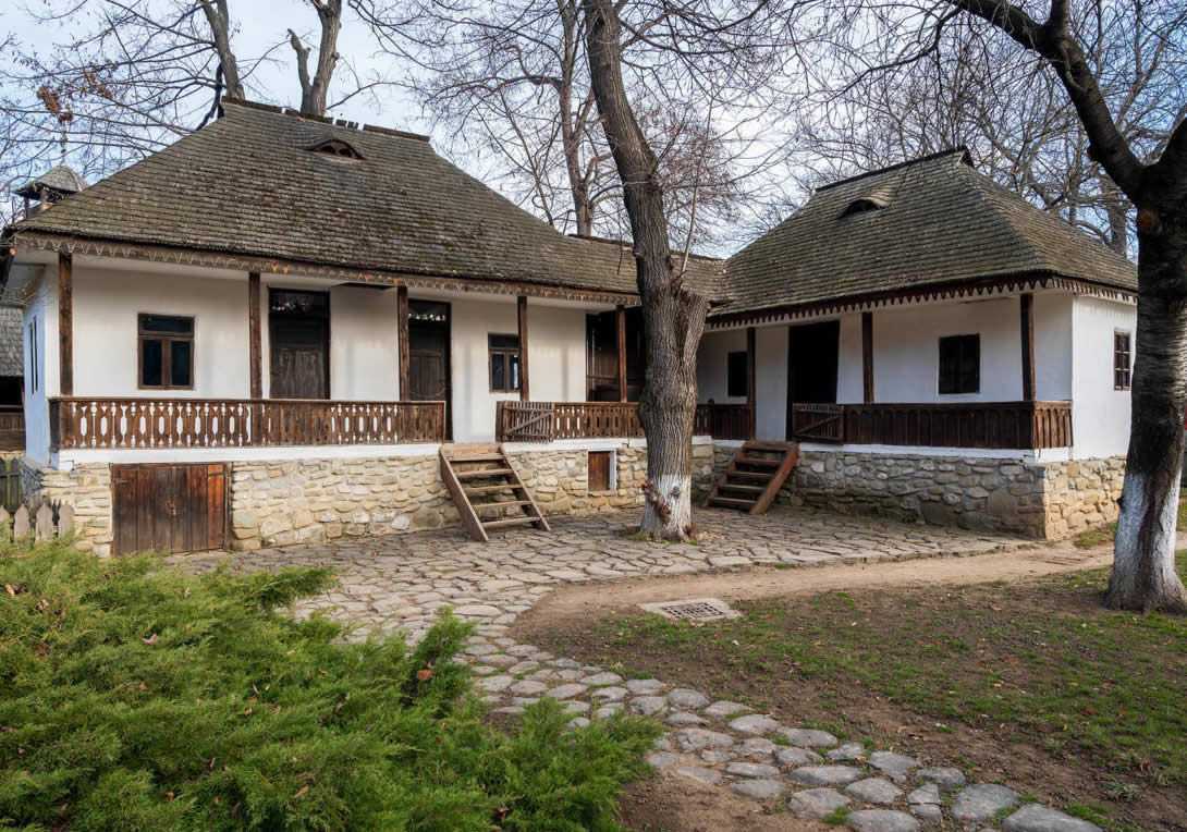 BUCHAREST, ROMANIA- 9 JANUARY, 2020: Rural houses at the National Museum of Dimitrie Gusti village